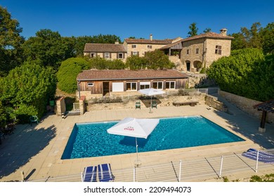 Barjac, France - July 24th 2022 : Aerial View With Drone Of A Sumptuous Stone Villa In The South Of France With A Pool