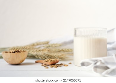 Barley milk as holistic drink for toxins elimination, helps to reduce acidity. beta-glucan source. vegan drink on a table