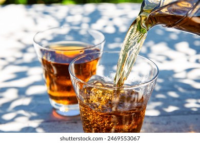 Barley tea, Japanese summer drink, photographed in the shade of a tree in the garden - Powered by Shutterstock