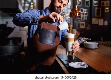 Barman barista in uniform making coffee tea, cocktails - Shutterstock ID 540092428