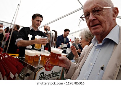 Barman Brewing A Draft Beer In Brussels, Belgium On June 7, 2017