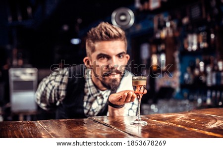 Barman concocts a cocktail on the brasserie