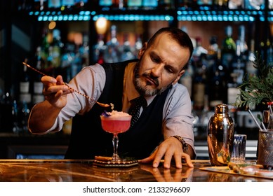 Barman Is Making Cocktail At Night Club.