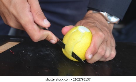 Barman Making A Signature Cocktail