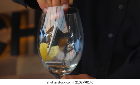 Barman Making A Signature Cocktail