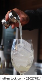 Barman Making A Signature Cocktail