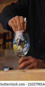 Barman Making A Signature Cocktail