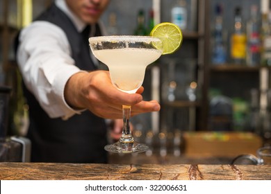 Barman Serving Margarita Cocktail