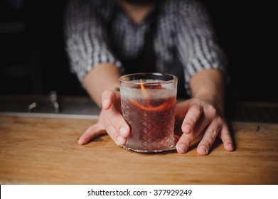 Barman at work, serving cocktails. no face  - Powered by Shutterstock