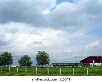 barn with clouds
