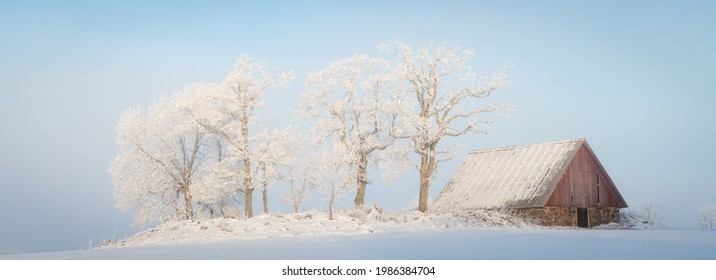 Barn In Cold Winter Landscape