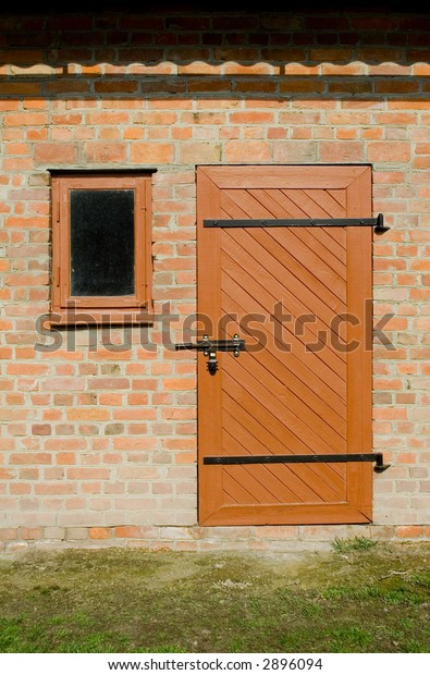 Barn Door Small Window Next Brick Stock Photo Edit Now 2896094