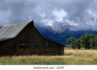 barn with mountain backdrop