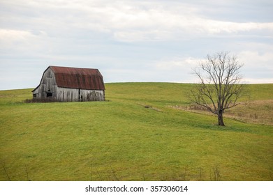 Barn Nestled On Country Hillside