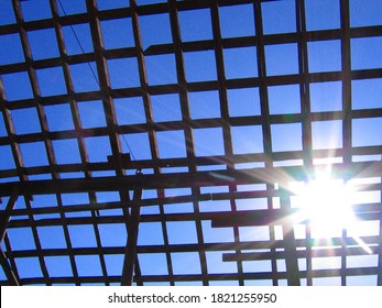 Barn Rafters Looking At Sun Glare.