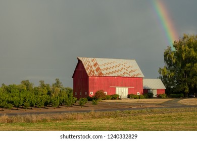 Barn and rainbow