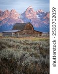 A barn at sunrise along Mormon Row in Grand Teton national park