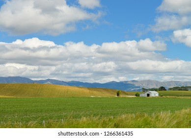 Barn Surrounded By Mountains, North Otago, New Zealand.
