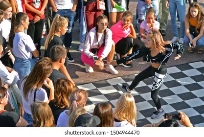 Barnaul, RUSSIA - 24 August 2019: Girls 15 - 20 Years Old Dance On The Street Dance Floor During Dance Competitions. The Confrontation Between The Dancers. View From Above. Dance Battle Festival.