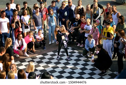 Barnaul, RUSSIA - 24 August 2019: Girls 15 - 20 Years Old Dance On The Street Dance Floor During Dance Competitions. The Confrontation Between The Dancers. View From Above. Dance Battle Festival.