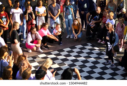 Barnaul, RUSSIA - 24 August 2019: Girls 15 - 20 Years Old Dance On The Street Dance Floor During Dance Competitions. The Confrontation Between The Dancers. View From Above. Dance Battle Festival.