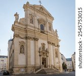 Baroque Dominican church of St. Maria Rotunda of the 17th century, view of main facade against the clear sky in autumn morning, Vienna, Austria
