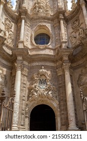 The baroque door of the Irons, which gives access to the Valencia Cathedral in Valencia, Spain on a sunny spring day. - Shutterstock ID 2155051211