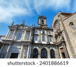 Baroque main portal and Gothic rose window of main facade St. Francis Church, Porto, Portugal.