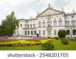 Baroque style Krasinski Palace seen from a French-style garden in summer in Warsaw, Poland