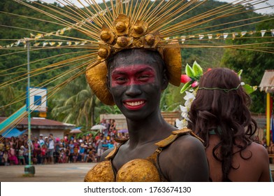Barotuan, El Nido, Palawan, Philippines - 21, January 2018: unidentified Filipino man at annual Ati-Atihan fiesta in Barotuan to honor Santo Nino (Infant Jesus) with parades, dances and performances