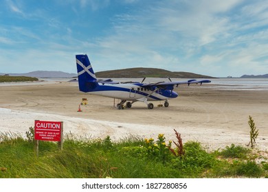  [Barra, Scotland - Aug 2020] Small plane on the sandy runway of Barra Airport, Scotland 