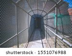 barred tunnel on the prison walker