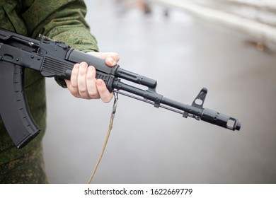 The Barrel Of An Assault Rifle. The Weapon In The Hands. Firearms In Combat Condition. Kalashnikov Assault Rifle. Training Soldiers. Military Subjects. For Lovers Of Military Training. 