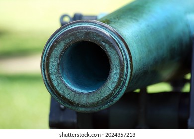           The Barrel Of  Old Historic Cannon In A Park                   