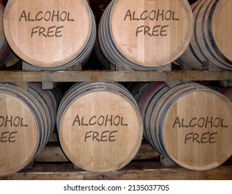 Barrels in cellar with text alcohol free. - Shutterstock ID 2135037705
