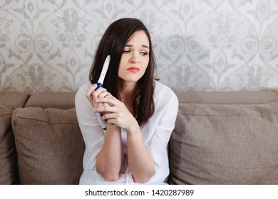 Barren Young Woman Sad When She Sees A Negative Pregnancy Test