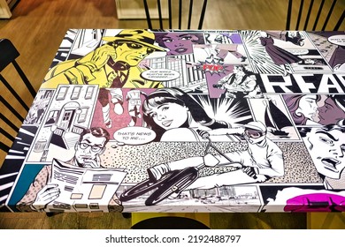 Barrie, Ontario, Canada - August 20, 2022 :  Comic Book Cartoon Characters Printed On Table Top At A Book Store. Unique Design And Creative Decor Element.