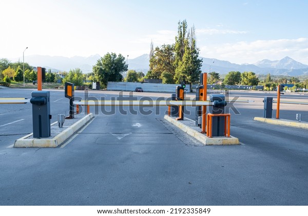 Barrier for paid parking of cars for visitors of\
the business center