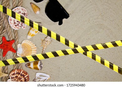 Barrier Tape - Quarantine, Isolation, Entry Ban. Summer Flat Composition With Seashells, Rope, Sand Beach And Space For Text On Sandy Background.