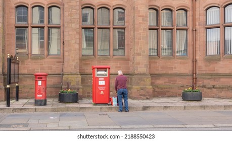 Barrow In Furness United Kingdom June 18 2022 Elderly Man Standing Next Too, Two Red Royal Mail Post Boxes