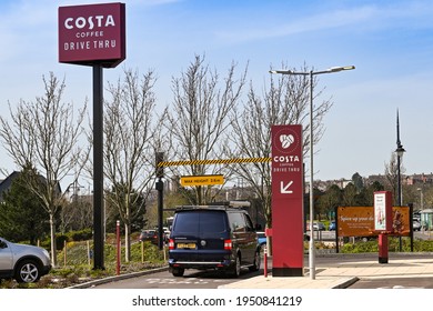 Barry, Wales - March 2021: Vehicle Driving Into The Entrance Of A Drive Thru Pick Up Point At A Branch Of Costa.