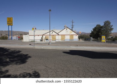 Barstow, CA / United States - 11/01/2019: A Closed Long John Silver's Restaurant Location. Building Is Boarded Up.