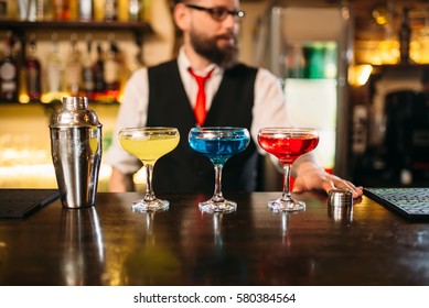 Bartender Behind Bar Counter Show Alcohol Coctails