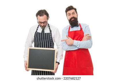 Bartender With Blackboard. Hipster Bartender Show Blackboard Copy Space. Hiring Staff. Men Bearded Hipster Informing You. Men Bearded Bartender Or Cook In Apron Hold Blank Chalkboard. Workers Wanted