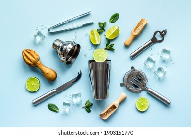 Bartender Equipment And Cocktail Ingredietns - Shaker, Lime And Ice. Overhead View