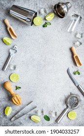 Bartender Equipment And Cocktail Ingredietns - Shaker, Lime And Ice. Overhead View