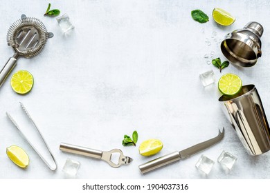 Bartender Equipment And Cocktail Ingredietns - Shaker, Lime And Ice. Overhead View