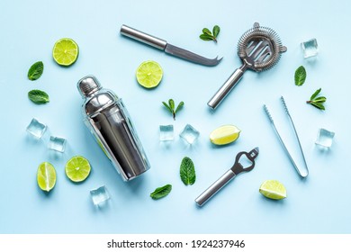 Bartender Equipment And Cocktail Ingredietns - Shaker, Lime And Ice. Overhead View