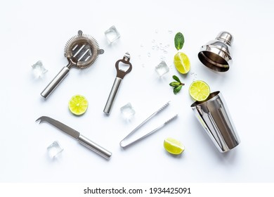 Bartender Equipment And Cocktail Ingredietns - Shaker, Lime And Ice. Overhead View