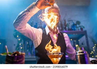 Bartender Making A Fire Flame Cocktail In A Elegant Night Club Party Unique Experience. 